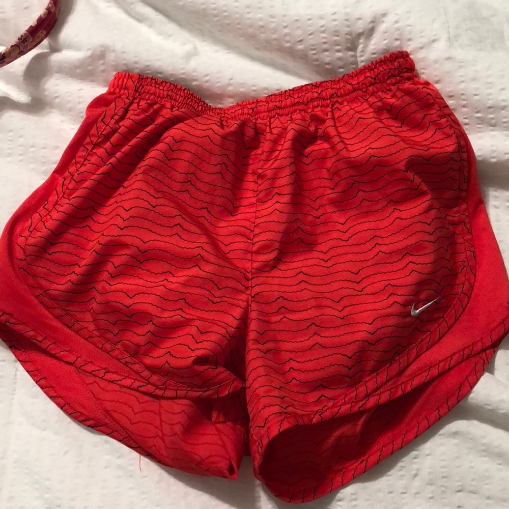 Red Nike shorts